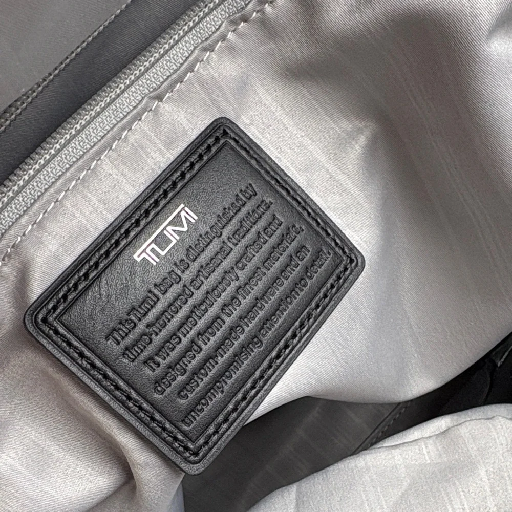 Tumi alpha deluxe carry on satchel in navy blue
